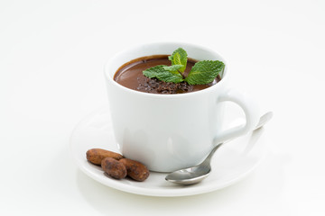 white cup with hot mint chocolate