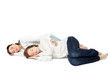 Young happy couple sleaping over white background