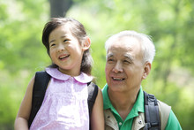 Girl And Grandfather In The Great Outdoors