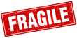 fragile red square grunge stamp on white