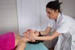 © OceanProd - massage of neck for woman in spa salon