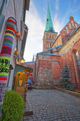 Canvas Print - Street view near St James Cathedral in the Old city of Riga in Latvia