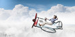 © Sergey Nivens - Woman in drawn airplane
