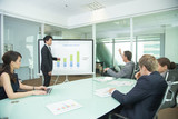 Fototapeta  - Business people in presentation