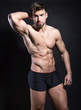 © Anetta - handsome young bodybuilder with toned body posing shirtless