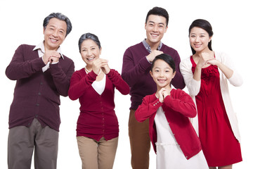 Wall Mural - Cheerful family greeting for Chinese New Year