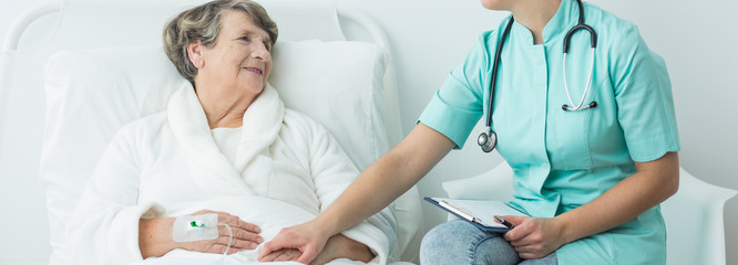 Canvas Print - Helpful nurse and patient