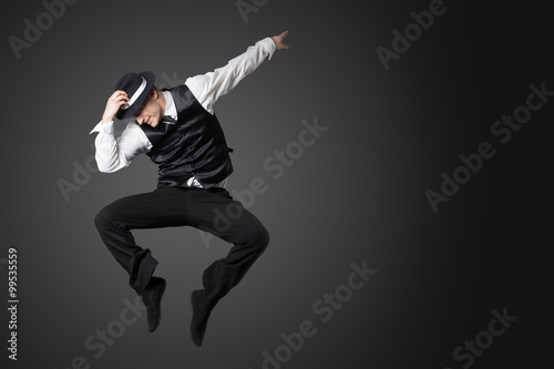 Young male professional dancer dancing in studio. Fotobehang