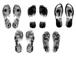 images of footprints silhouette. Each pair of footprints are on separate layer. Sixteen pairs of men and women footprints. Some of them are for shoes and some for sneakers.