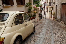 Small Italian Car On Narrow Road In Village Scilla