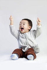 Cute little boy shouting with excitement