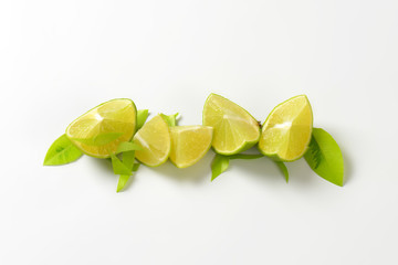 Wall Mural - Fresh lime fruit pieces