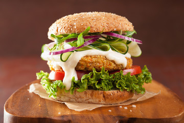 Canvas Print - veggie carrot and oats burger with cucumber onion