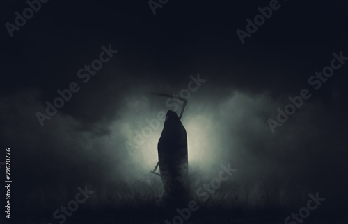 Láminas Grim reaper, the death itself, scary horror shot of Grim Reaper in fog holding scythe