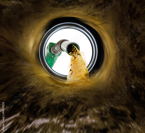 Fotomural Refilling fuel view from inside of gas tank of a car
