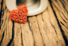Retro Valentine Heart On Old Wood Background.