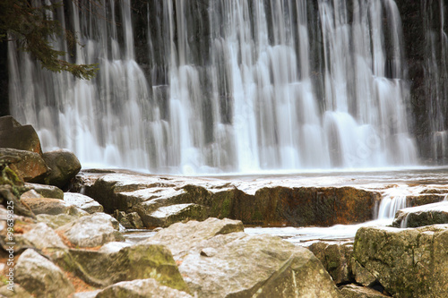 Fototapeta na wymiar Wild waterfall in the Polish mountains. River with cascades