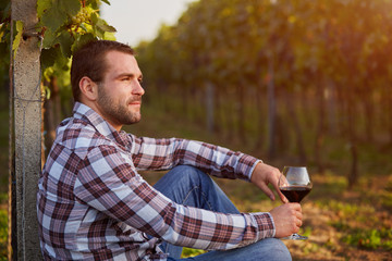 Winemaker with a glass of red wine