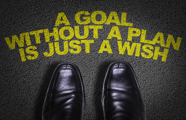 Top View of Business Shoes on the floor with the text: A Goal Without a Plan Is Just a Wish