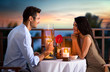canvas print picture - couple on summer evening having romantic dinner
