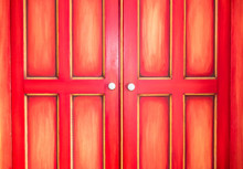 Red Wooden Doors With White Handles Paint Effect