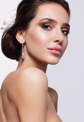 Portrait of beautiful young brunette woman bride