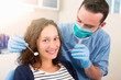 © Production Perig - Young attractive woman being cured by a dentist