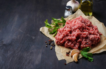 Raw minced meat with olive oil and garlic