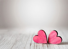Valentines Day Background With Two Red Hearts On Wooden Background