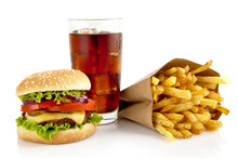 Big Cheeseburger With Glass Of Cola And French Fries Isolated On
