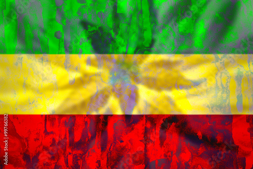 Fotografie, Obraz Cannabis bud on grunge rastafarian flag.