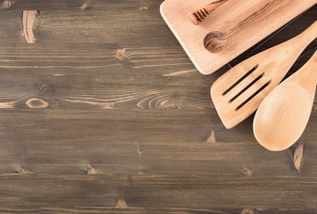 Wall Mural - Kitchen utensils on wooden background