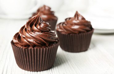 Poster - Cupcakes served with a drink on table