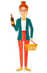 Wall Mural - Customer with shopping basket and bottle of wine.