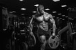 © Fotokvadrat - Muscular athletic bodybuilder fitness model posing after exercises in gym