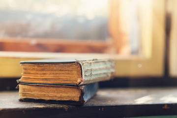 Old books on windowsill