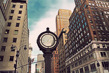 Fifth Avenue Building In New York City And Big Clock