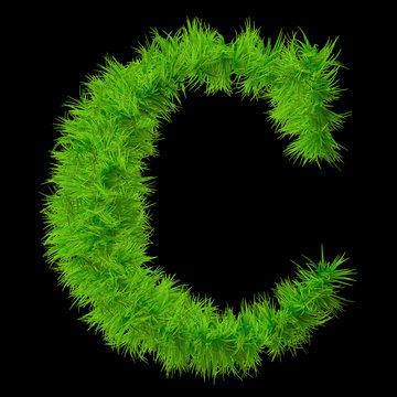 Conceptual green grass 3D font isoalted on black