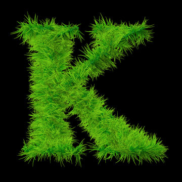 Conceptual green grass 3D font isoalted on black