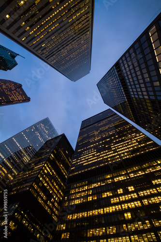 Stampa su Tela night view of city skyscrapers