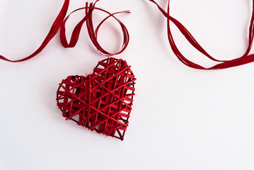 stylish red heart with ribbons, isolated on white background, va