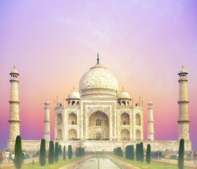 Fototapete - Beautiful sunset over Taj Mahal palace in India, Agra