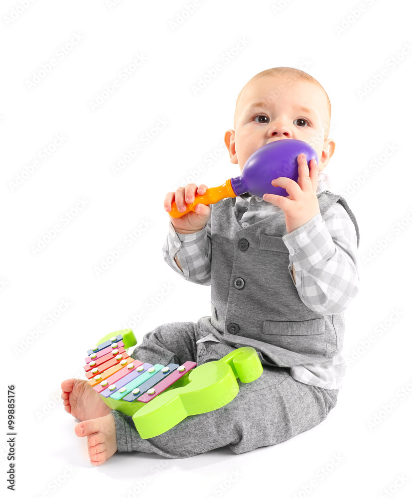 Adorable baby with plastic colourful xylophone isolated on white background