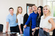 © kanzefar - The team of young successful business people in the office