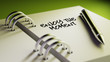 © xtock - Closeup of a personal agenda setting an important date writing w