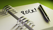 © xtock - Closeup of a personal agenda setting an important date writing w