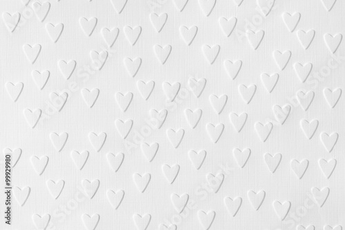 Valokuva Background of white paper with embossed hearts
