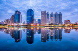 Fototapeta Miasta - Bangkok city downtown at morning with reflection of skyline, Thailand