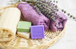 Spa products with lavender soap,flowers and towels