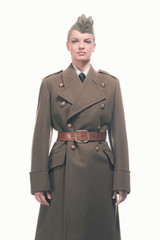 Wall Mural - Retro army uniform fashion woman isolated against white.